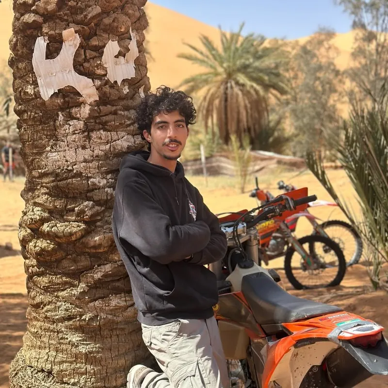 Rider and motorcycles in Merzouga